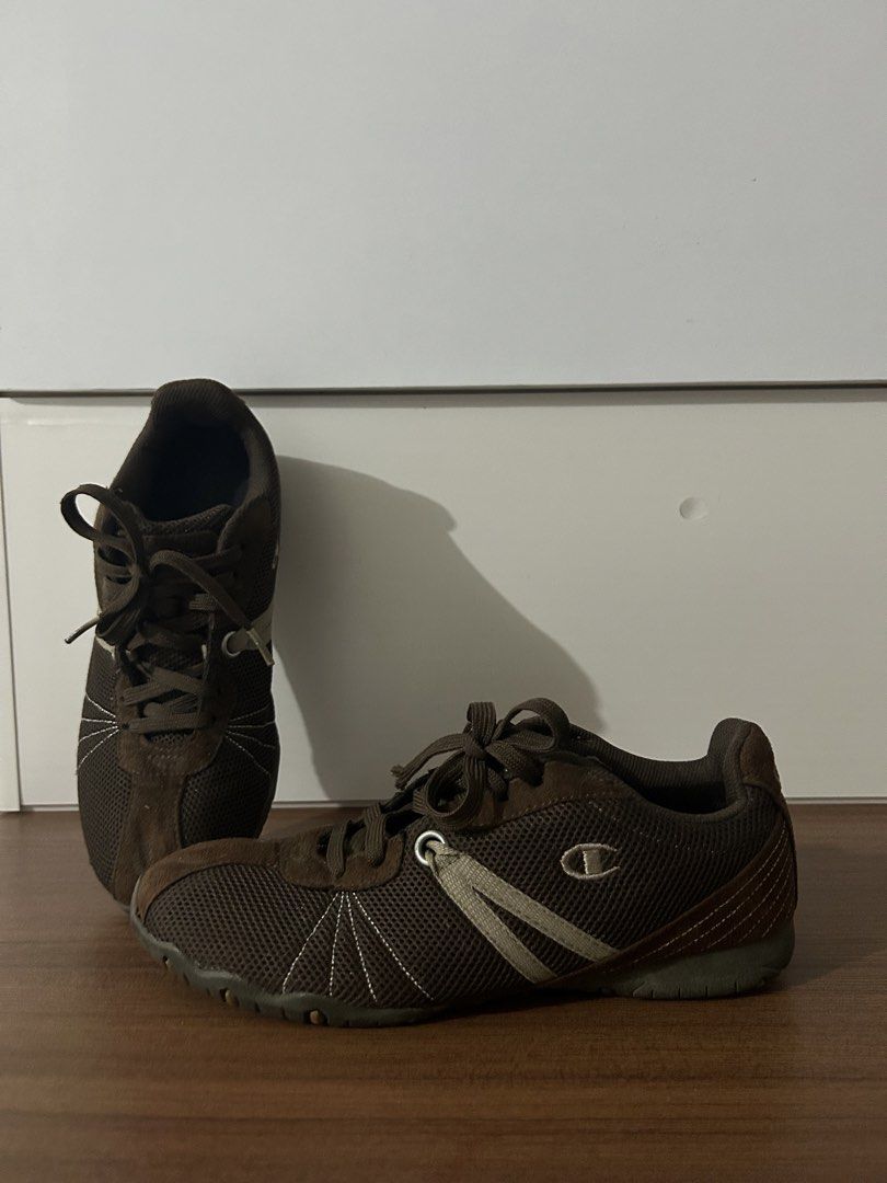 Vintage Brown Champion Sneakers (Category: Sneakers) located in Tarlac. Submitted by clydeascope (Listing ID 1449238728, Image 1). Description: - Brown Champion sneakers - Lace-up style - Mesh and suede material - White stitching detail on sides - Perfect for casual wear or light workouts - Size: 8 womens but can fit 7 mens - Issue/s: Stains **PLEASE TAKE NOTE** - No returns, refunds, or exchanges. Please purchase at your own risk. - I will provi