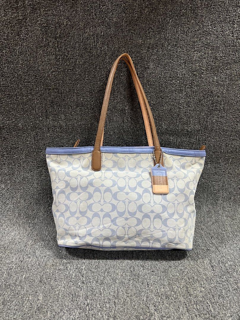 Vintage Coach Legacy Weekend Zip Tote (Category: Tote Bags) located in Cebu City. Submitted by beyond.curations (Listing ID 1449230225, Image 1). Description: Vintage Coach Legacy Weekend Zip Tote Authentic / no major flaws in Pristine 9.6 / 10 Number : 23107 .