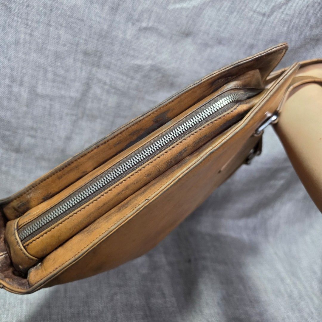 Vintage document bag (Category: Briefcases) located in Manila. Submitted by greyinfash06839 (Listing ID 1449240333, Image 2). Description: 🤍Item: Vintage document bag 🤍Brand: Unknown 🤍Matirial: Leather 🤍Quality: Good quality 🤍color: Brown 🤍Size: Large 🤍Dimension. H: 12 L: 14 W: 2 🤍Sex: For Men 🤍Issue: Minimal flaws 🤍Condition Rate: 7/10 🤍Other info:.