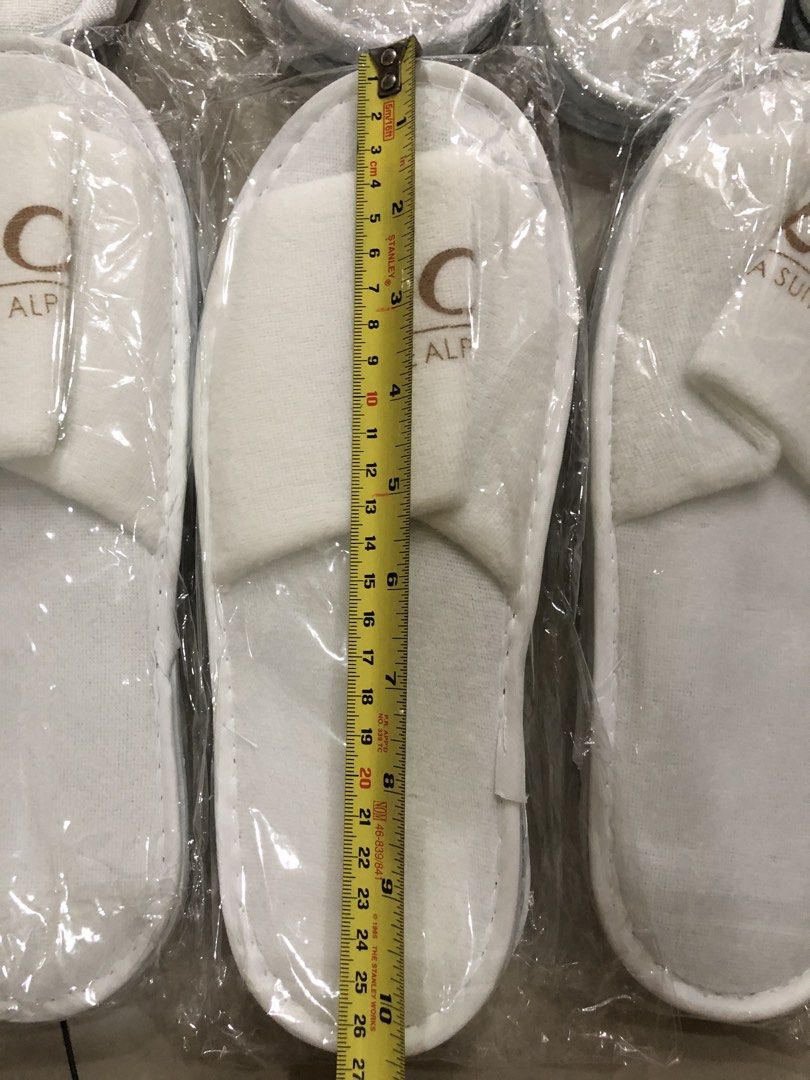 White Hotel Slippers - Balesin & Alpha Suites (Category: Slippers and slides) located in Manila. Submitted by Declutterland (Listing ID 1449265136, Image 2). Description: - Brand new! Balesin Island Club and Alpha Suites white hotel slippers@80/pair - Each pair is individually wrapped - Thick material and durable - Perfect for guest use or personal comfort - Approximate length: 27-28cm for femaile, 30-31cm for male .