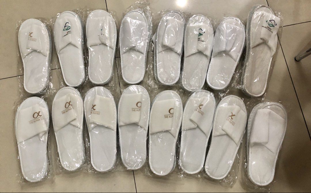 White Hotel Slippers - Balesin & Alpha Suites (Category: Slippers and slides) located in Manila. Submitted by Declutterland (Listing ID 1449265136, Image 1). Description: - Brand new! Balesin Island Club and Alpha Suites white hotel slippers@80/pair - Each pair is individually wrapped - Thick material and durable - Perfect for guest use or personal comfort - Approximate length: 27-28cm for femaile, 30-31cm for male .