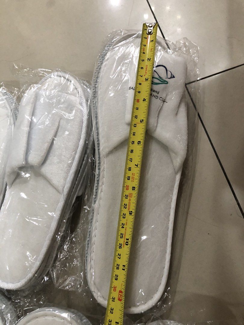 White Hotel Slippers - Balesin & Alpha Suites (Category: Slippers and slides) located in Manila. Submitted by Declutterland (Listing ID 1449265136, Image 3). Description: - Brand new! Balesin Island Club and Alpha Suites white hotel slippers@80/pair - Each pair is individually wrapped - Thick material and durable - Perfect for guest use or personal comfort - Approximate length: 27-28cm for femaile, 30-31cm for male .