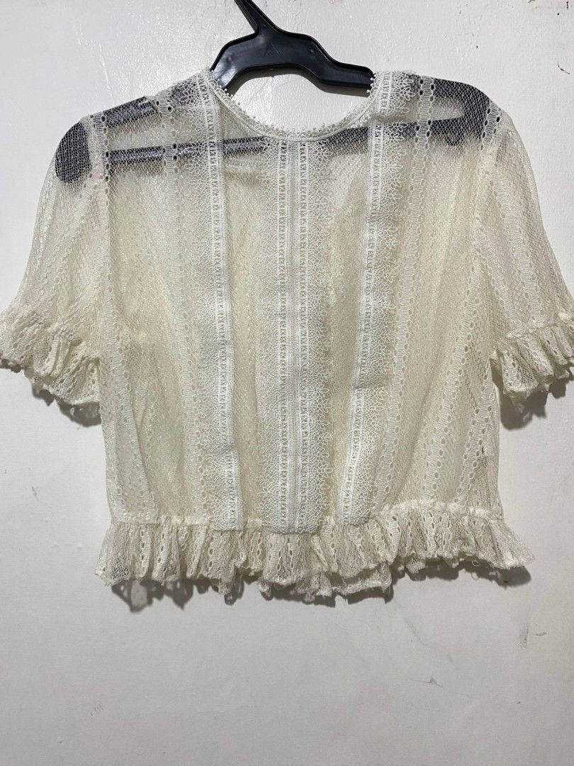 White Lace Cropped Top with Ruffle Sleeves (Category: Blouses) located in Quezon City. Submitted by lilive (Listing ID 1449304613, Image 1). Description: freebie if You buy 2 mop: gcash, Maya mod: jnt, lalamove loc: QC.