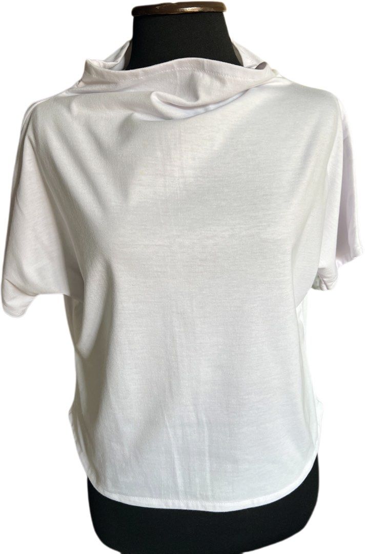 White Short Sleeve Top with High Cowl Neck (Category: Blouses) located in Muntinlupa City. Submitted by chiaraa400 (Listing ID 1449222002, Image 2). Description: - White short sleeve top - comfort of a T-shirt; designed top - Features a high cowl neck design - Easy to pair with various bottoms.