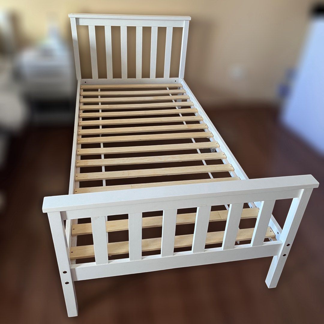 White Wooden Single Bed Frame (Category: Bed Frames & Mattresses) located in Paranaque City. Submitted by atothea (Listing ID 1449170824, Image 1). Description: Flaws shown in slides 7-8 RFS: Moving out of condo Will be available starting 2nd/3rd week of August.