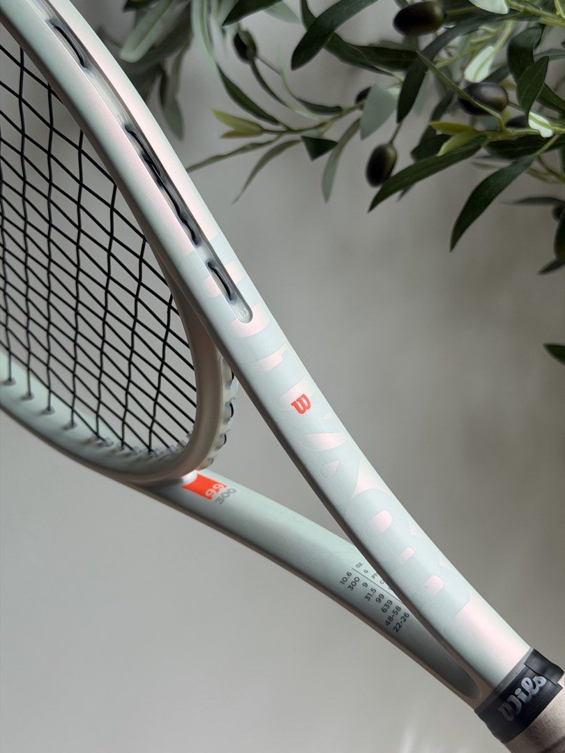 Wilson Shift 99L V1 300g Tennis Racket (Category: Racket and Ball Sports) located in Mandaluyong City. Submitted by declutteringjkate (Listing ID 1449113290, Image 1). Description: - Wilson Shift 99 300g Tennis Racket - Head Size: 99 sq. in. - String Pattern: 16x20 - Unstrung Weight: 300g - Balance: 31.5cm - Swingweight: 310 - Recommended Tension: 48-58 lbs - Grip Size: 2 - Speed and spin racket With Wilson Power String Super nice racket 🥹 have 