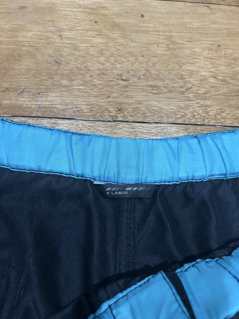 X Large Black Shorts with Blue Trim (Category: Everything Else Others) located in Manila. Submitted by Declutterland (Listing ID 1449267735, Image 2). Description: - Black shorts with blue waistband and trim - Elastic waistband with drawstring - Back pocket included - Size XL - Ideal for casual wear or sports activities.