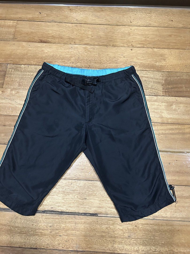 X Large Black Shorts with Blue Trim (Category: Everything Else Others) located in Manila. Submitted by Declutterland (Listing ID 1449267735, Image 3). Description: - Black shorts with blue waistband and trim - Elastic waistband with drawstring - Back pocket included - Size XL - Ideal for casual wear or sports activities.