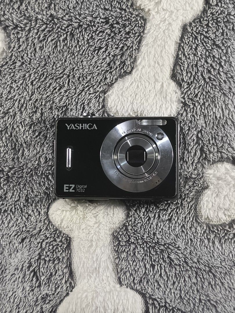 Yashica EZ Digital 7052 Camera (Category: Cameras) located in Mabalacat. Submitted by by.mo_nograph (Listing ID 1449288379, Image 1). Description: PRICE NEGOTIABLE ISSUES OVEREXPOSURE LENS NEED GUIDE TO OPEN - Black Yashica EZ Digital 7052 camera - Compact point-and-shoot style - 7.1 megapixel sensor - Compatible with SD cards - with battery included.