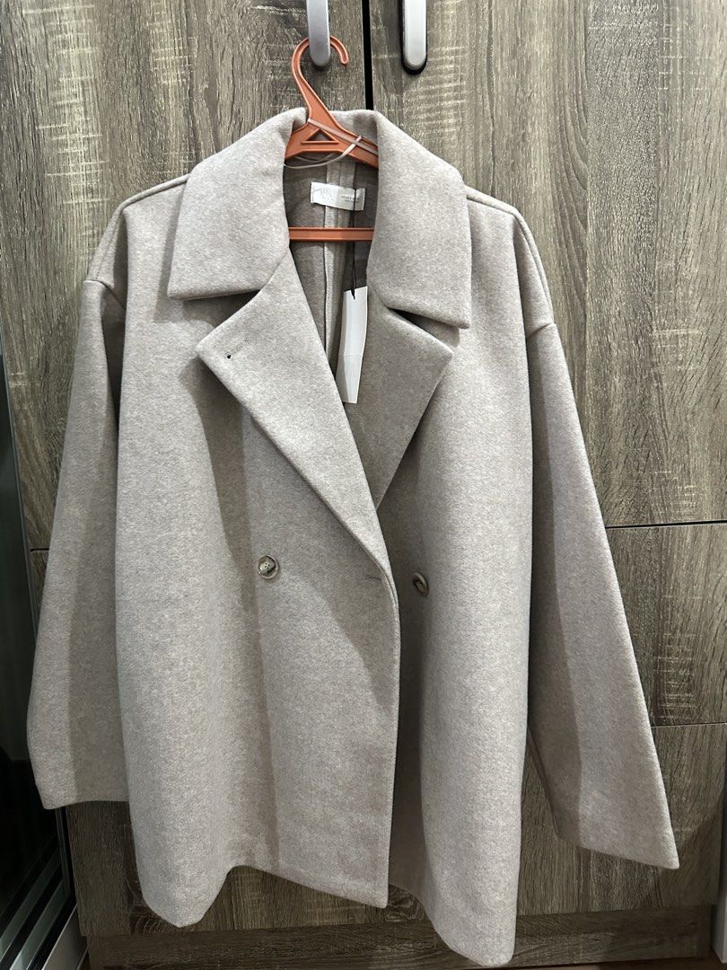 Zara Double-Breasted Wool Blend Coat - Beige - Size S (Category: Coats, Jackets and Outerwear) located in Manila. Submitted by itsyourgirlmc (Listing ID 1449231988, Image 1). Description: - Zara beige double-breasted coat - Wool blend material - Size S - Two front buttons - Perfect for layering - Original tag still attached - bought this for 2795 -never used since our Korea trip was cancelled 🥺.