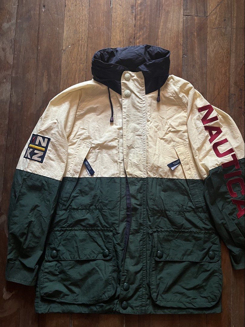 1990s Nautica NKZ Sailing Parka Jacket (Category: Coats, Jackets and Outerwear) located in Los Banos. Submitted by lootmeup (Listing ID 1449477901, Image 1). Description: 1990s Nautica NKZ Sailing Parka Jacket Split colorblock design Packable hood, double zip Unique piece 🔥 Issue: need wash Size: Width: 23 Length: 30 Mine P1,500.