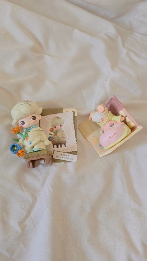 [2 Figures] Bundle Deal: Dimoo The Missing Day (Blooming Button & Soul Trails) (Category: Toys & Games) located in Subang Jaya. Submitted by iseemaira (Listing ID 1449422325, Image 1). Description: 🌷 POP MART DIMOO The Missing Day Collection (Duo Bundle) 🌷 Selling these adorable DIMOO The Missing Day Collection figures as a bundle only 🤍 ✨ Includes: • Blooming Button 🌼 (no box, have card) • Soul Trail 🩷 (no box, no card) • Original from PopM