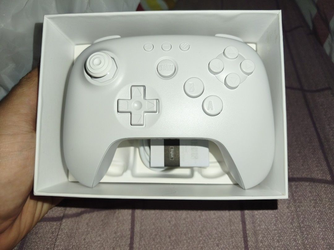 8BitDo 64 Bluetooth Controller White (Category: Controllers) located in Kawit. Submitted by kennedy000 (Listing ID 1449515595, Image 2). Description: Selling! 8BitDo 64 Bluetooth Controller Nagkamali ng bili hindi ito yung controller na hanap ko. Brand new, binuksan lang to check. Orig Price: 1450 Selling Price: 1350 Can do meetups: Kawit, Noveleta, Sm Bacoor.
