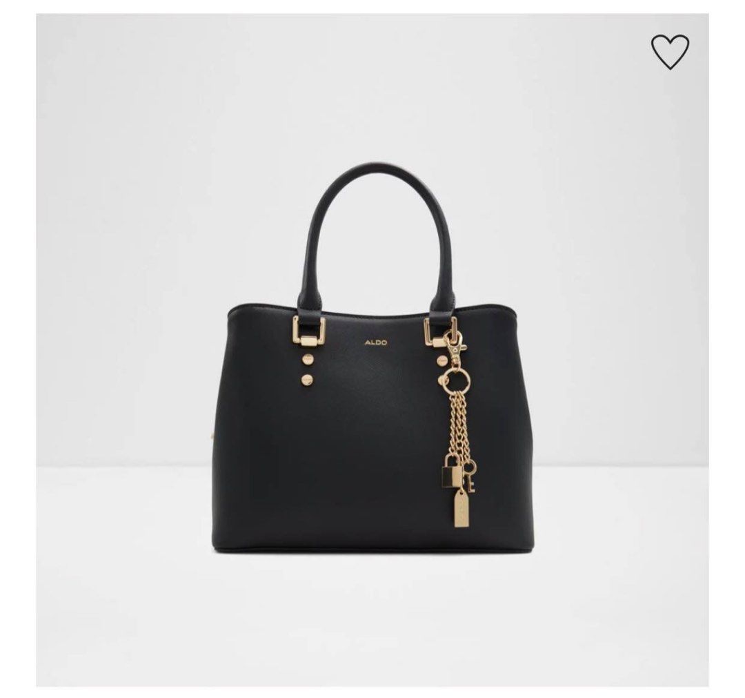 ALDO Black Leather Top Handle Bag with Charm (Category: Luxury Bags & Wallets) located in Marikina City. Submitted by mycollectionsph (Listing ID 1449482628, Image 3). Description: Black leather Aldo handbag. Gold hardware details. Comes with a cute charm featuring a lock and key. Top handles and a detachable shoulder strap. Zipper closure. Interior has a contrasting deep red lining. Dust bag included..