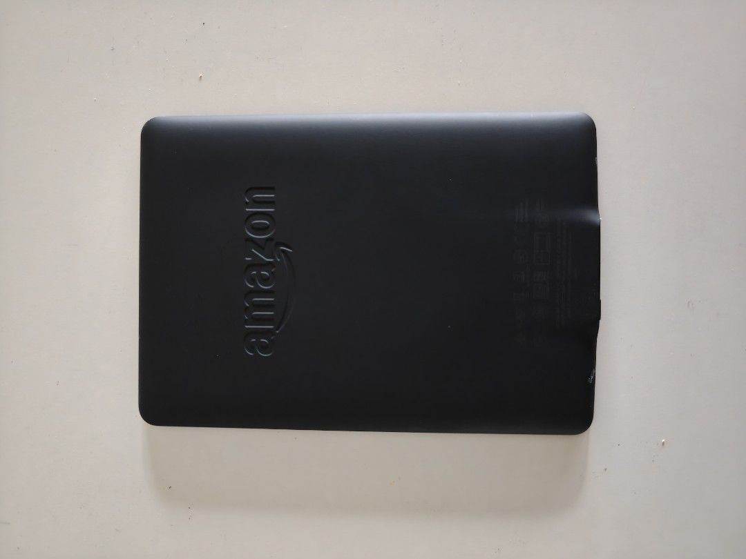 Amazon Kindle E-reader Black (Category: E-Readers) located in Singapore. Submitted by naveenkumar248 (Listing ID 1449409813, Image 2). Description: - Black Amazon Kindle - Good working order - Clear and bright screen - Perfect for reading on the go - Includes charging cable - Ready for your next adventure https://amzn.asia/d/0iFbF7Xa.