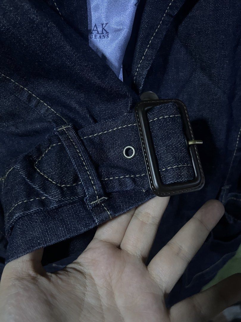Anne Klein Denim Trench Coat (Category: Coats, Jackets and Outerwear) located in Manila. Submitted by mstenj (Listing ID 1449498715, Image 2). Description: - AK Jeans by Anne Klein dark wash denim trench coat - Bright blue satin lining with AK Jeans logo print - Button front closure - Belt detail at the waist - Two front pockets - Versatile layering piece for any season.