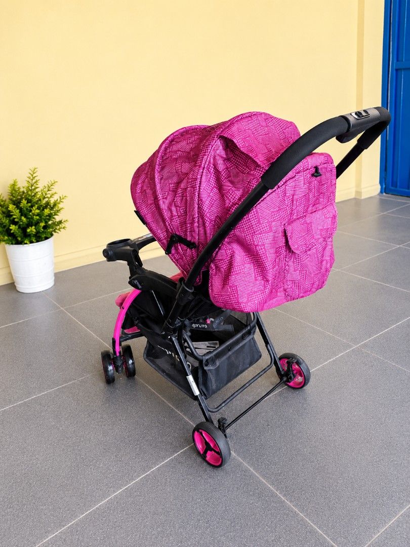 APRUVA ALLER Stroller Pink - Reversible, Reclinable (Category: Strollers) located in Manila. Submitted by sandralove07184 (Listing ID 1449386034, Image 3). Description: 🌸 Apruva Aller Reversible Baby Stroller for Sale 🌸 Selling our pre loved Apruva pink baby stroller in good used condition. Lightweight, easy to push, and folds for convenient storage and travel. Comes with a canopy for sun protection, storage basket underneath, and cup holder tr