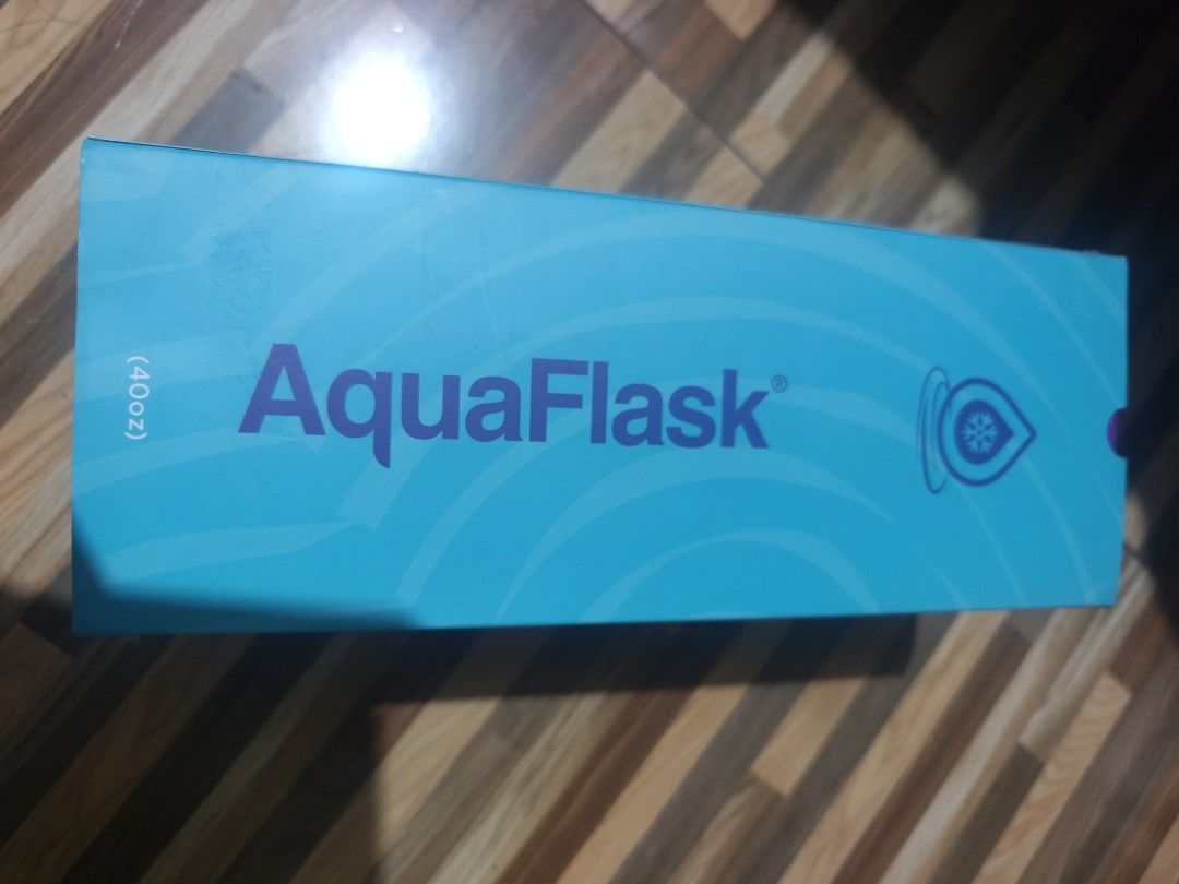 AquaFlask Trek 40oz Conner Water Bottle (Category: Water Bottles & Tumblers) located in Muntinlupa City. Submitted by gdupalco (Listing ID 1449468325, Image 3). Description: - AquaFlask Trek 40oz water bottle - Stylish teal and blue ombre color - Includes original box - Perfect for staying hydrated on the go - Durable and fashionable design.