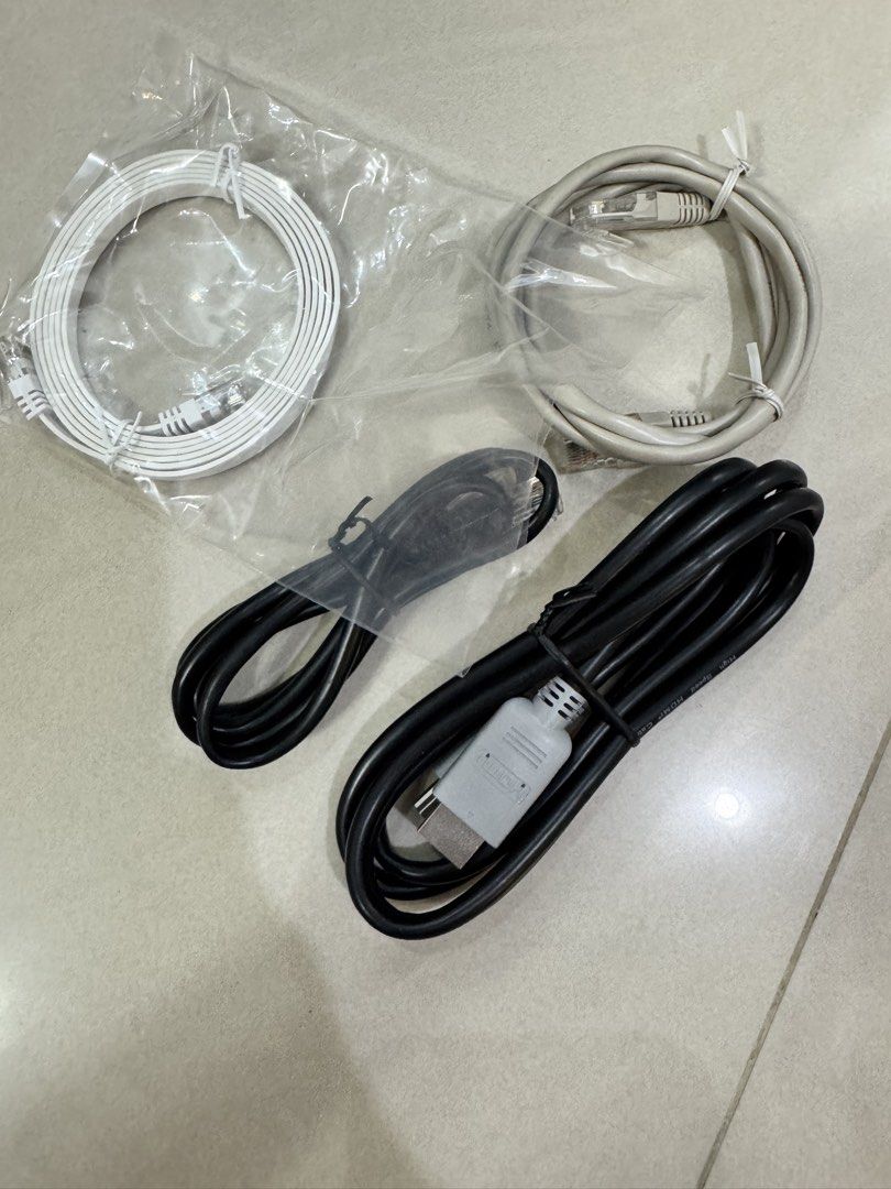 Assorted Cables: Ethernet, USB, and Power Cables