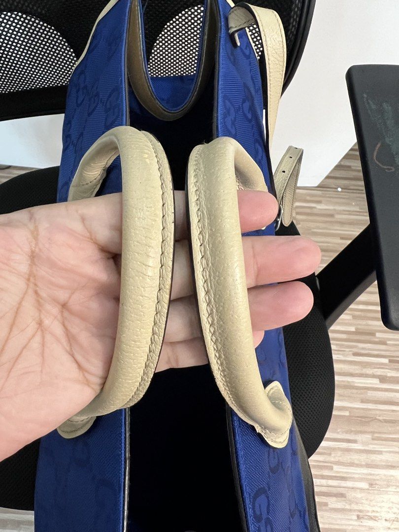 Authentic Gucci GG Off-the-grid Monogram Blue Nylon Tote (Category: Luxury Bags & Wallets) located in Muntinlupa City. Submitted by goldinmygarage (Listing ID 1449500168, Image 2). Description: - Authentic Blue Gucci Tote Bag - Signature GG Pattern - Beige Leather Trim and Handles - Spacious interior for essentials - Ideal for everyday use or travel.