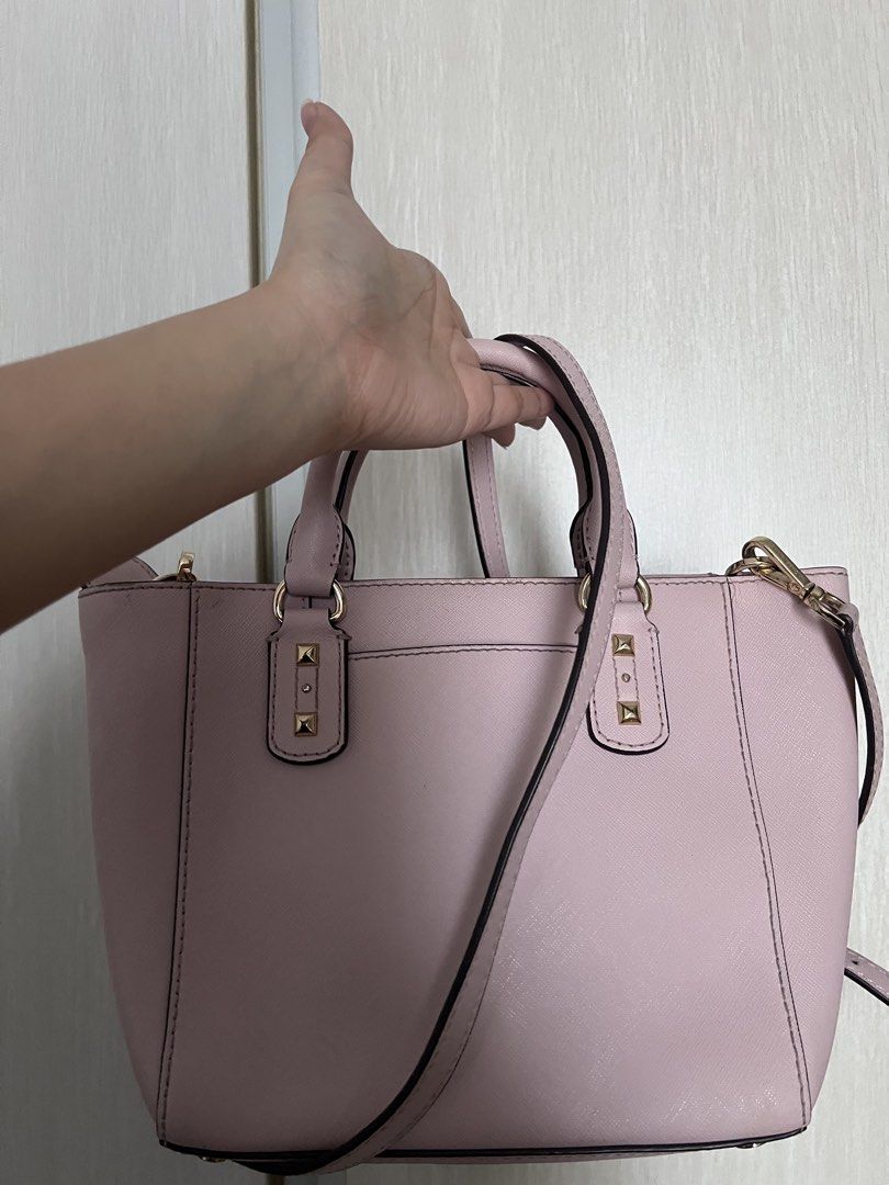 Authentic Michael Kors Two Way Bag (Category: Luxury Bags & Wallets) located in Manila. Submitted by ot7purple (Listing ID 1449355313, Image 2). Description: - Authentic Michael Kors bag in a lovely light pink color - Two way comes with both top handles and a detachable crossbody strap -Used only a few times ***Shipping fee not included. 📲IG: sofiajeneve.