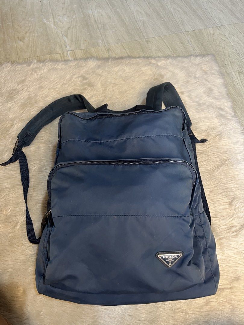 Authentic Prada Nylon Backpack (Category: Luxury Bags & Wallets) located in San Antonio. Submitted by kimbags (Listing ID 1449350622, Image 1). Description: Supet nice pa Color slightly fade but no holes/runs Good condition .