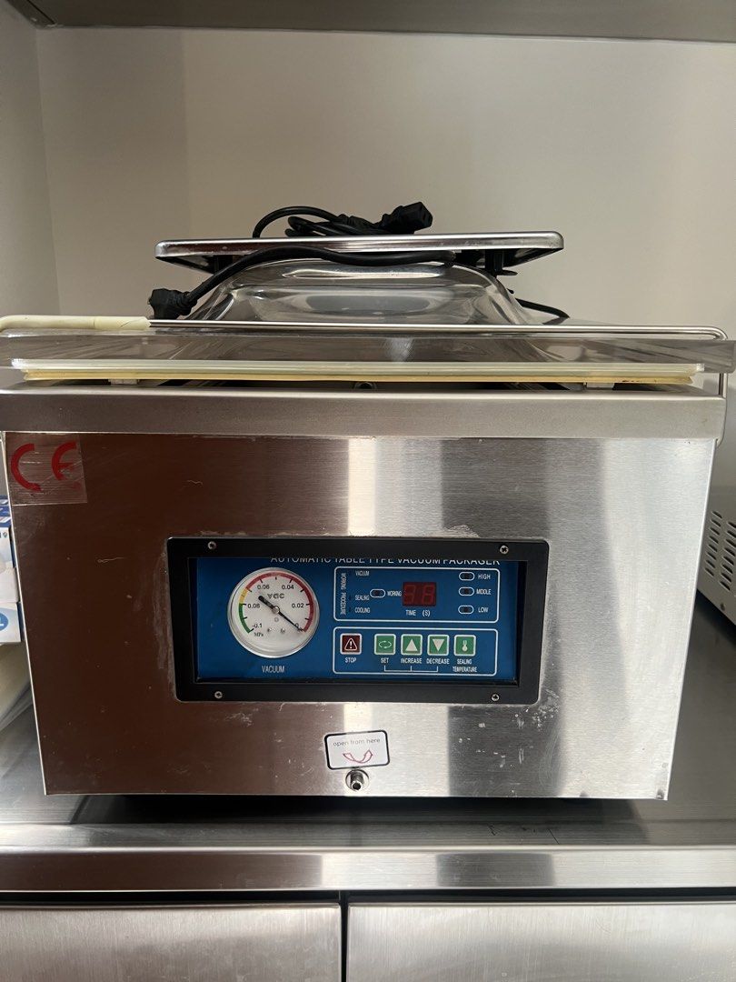 Automatic Table Type Vacuum Sealer (needs to be repaired) (Category: Home Improvement Tools & Accessories) located in Manila. Submitted by squathleen (Listing ID 1449417228, Image 1). Description: - Automatic table type vacuum packager - Durable stainless steel construction - Built-in vacuum gauge for precise control - Digital display for easy time and temperature settings - User-friendly buttons: Stop, Set, Increase, Decrease, Sealing Temperatur