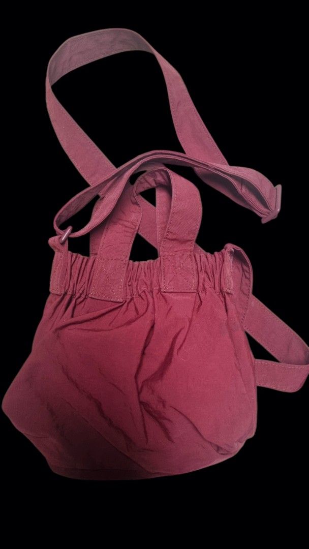 Beyond The Vines Nylon Drawstring micro (Category: Cross-body Bags) located in Quezon City. Submitted by kcobs (Listing ID 1449465959, Image 2). Description: - Brand: Beyond The Vines - guaranteed authentic 💯 - Type: Drawstring Bag - Color: Burgundy/Maroon - Material: 100% Nylon - Features: Front pocket with snap button closure, adjustable straps - Benefits: Great for everyday use, easy to pack and carry -size: micro - used several times, like 5