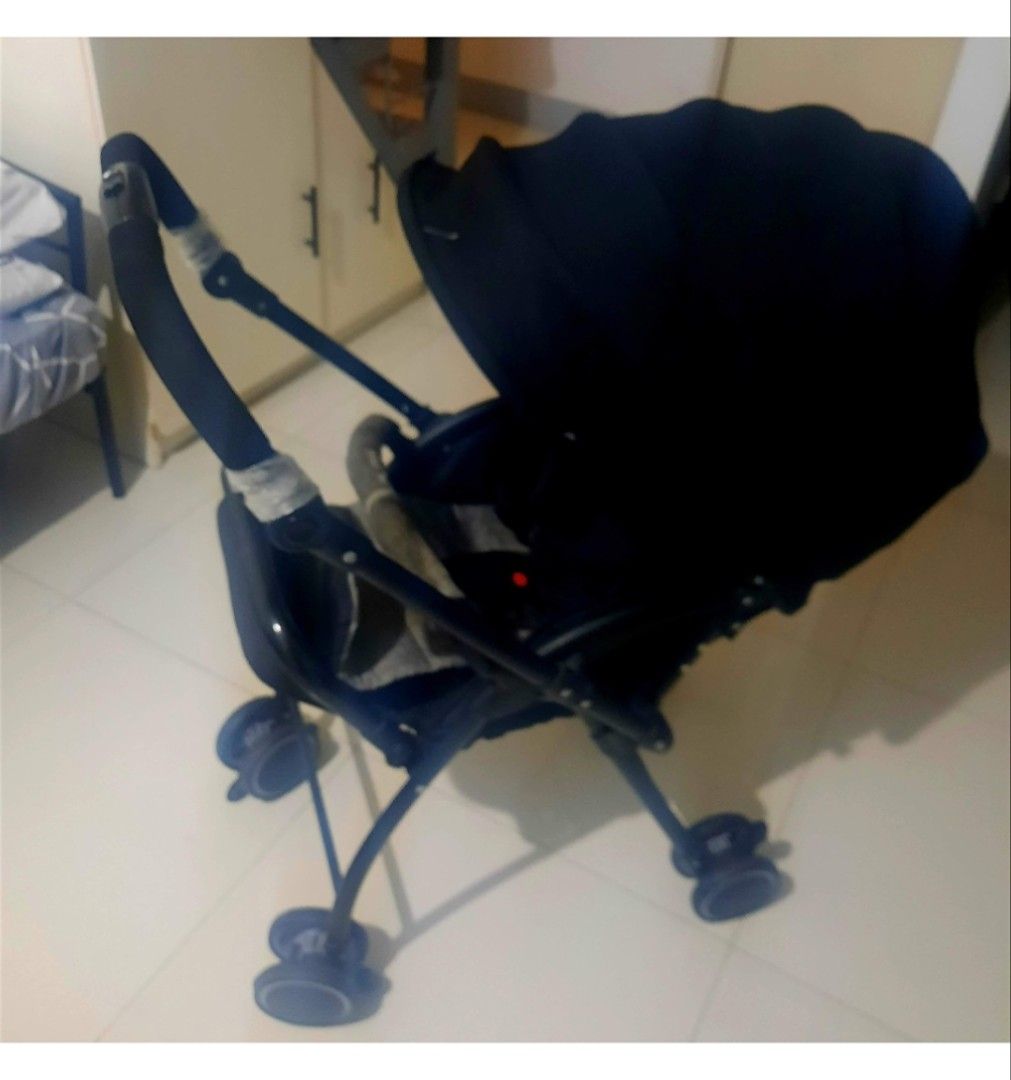 Black Baby Stroller (Category: Strollers) located in Quezon City. Submitted by concepcionmark04 (Listing ID 1449401227, Image 2). Description: Baby 1st Brand - Black baby stroller - Canopy for sun protection - Padded handle for comfort - Reversible handle - Folds for easy storage - Ideal for walks and errands For pickup or meet up Angono rizal.