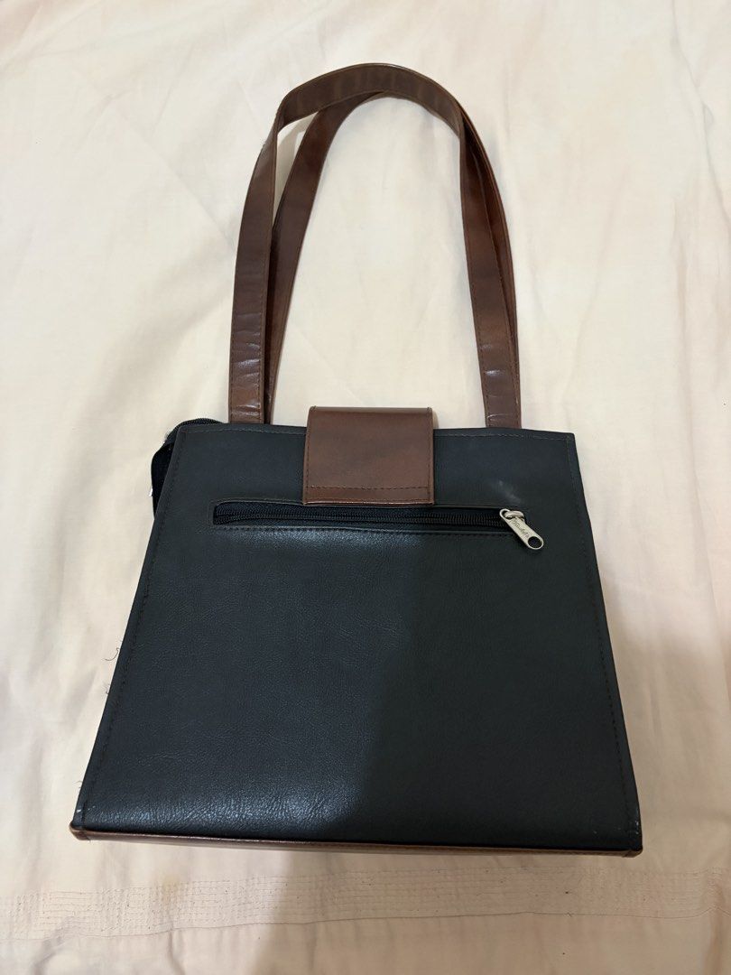 Black Brown Leather Top Handle Bag (Category: Shoulder Bags) located in Antipolo. Submitted by nnnxjje (Listing ID 1449466065, Image 3). Description: - Kimbel bag - no issues - used a few times only - can fit a lot - price is negotiable for sure buyers.