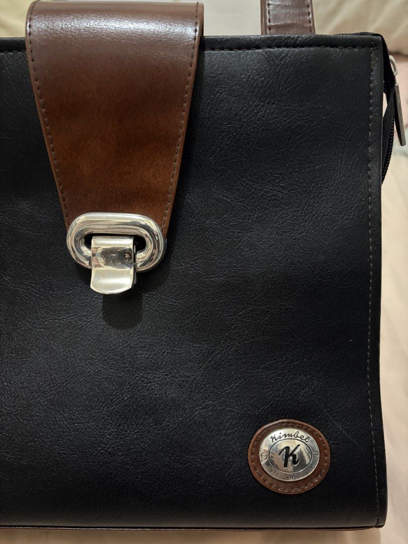 Black Brown Leather Top Handle Bag (Category: Shoulder Bags) located in Antipolo. Submitted by nnnxjje (Listing ID 1449466065, Image 2). Description: - Kimbel bag - no issues - used a few times only - can fit a lot - price is negotiable for sure buyers.