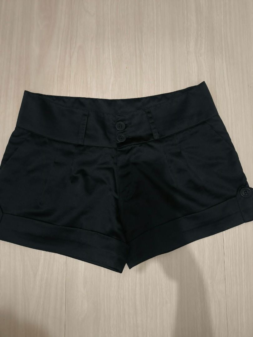 Black High-Waisted Shorts with Button Detail (Category: Shorts) located in Manila. Submitted by weyt_k (Listing ID 1449506965, Image 1). Description: SIZE: 41CM W / 30CM L - High-waisted black shorts - Double button front closure - Cuffed hem with side button details - Satin-like material - Versatile for dressing up or down.