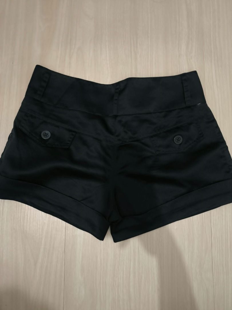 Black High-Waisted Shorts with Button Detail (Category: Shorts) located in Manila. Submitted by weyt_k (Listing ID 1449506965, Image 2). Description: SIZE: 41CM W / 30CM L - High-waisted black shorts - Double button front closure - Cuffed hem with side button details - Satin-like material - Versatile for dressing up or down.