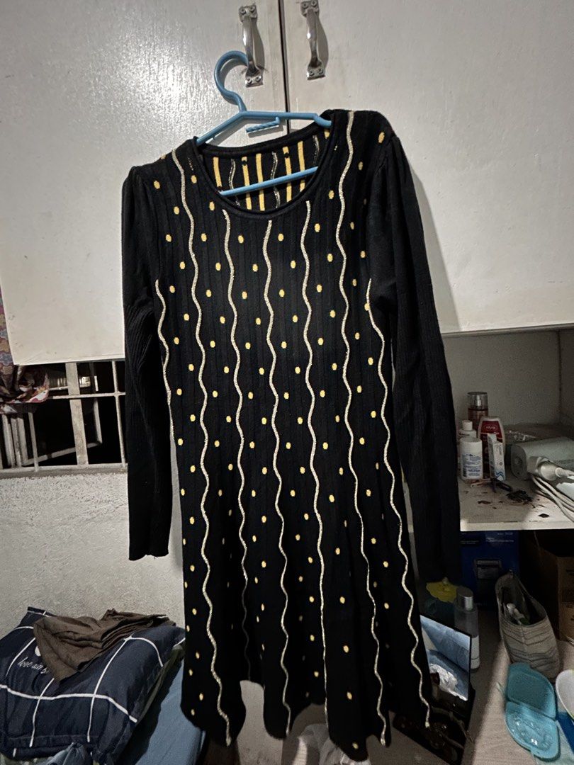 Black Long Sleeve Dress with Yellow Polka Dot Pattern (Category: Dresses) located in Baliuag. Submitted by declutteringbyjmt (Listing ID 1449457772, Image 1). Description: - Black long sleeve dress - Features a fun yellow polka dot and wavy line pattern - Textured knit fabric for comfort - Versatile for casual or dressed-up looks - Comfortable and stylish design.