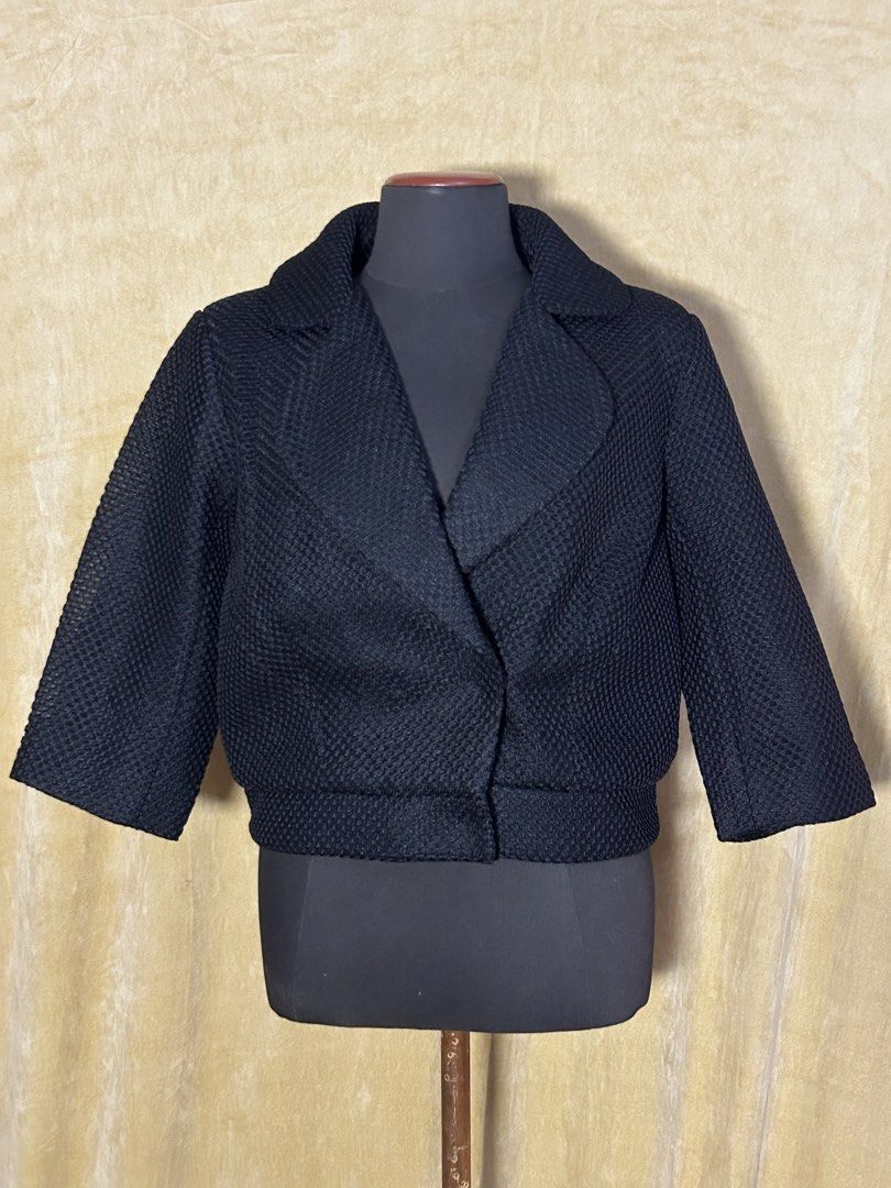 Black Textured Cropped Jacket with Collar (Category: Coats, Jackets and Outerwear) located in Batangas. Submitted by mkjgb (Listing ID 1449410879, Image 1). Description: Bought in Palm Springs, CA. Length from shoulder is 19”. Width at waist is 16.5” (laid flat). - Black textured cropped jacket - Features a collar - Three-quarter sleeves - Single button closure - Ideal for layering or wearing solo - Versatile piece ❄️ Travel-Ready Winter Wear | S