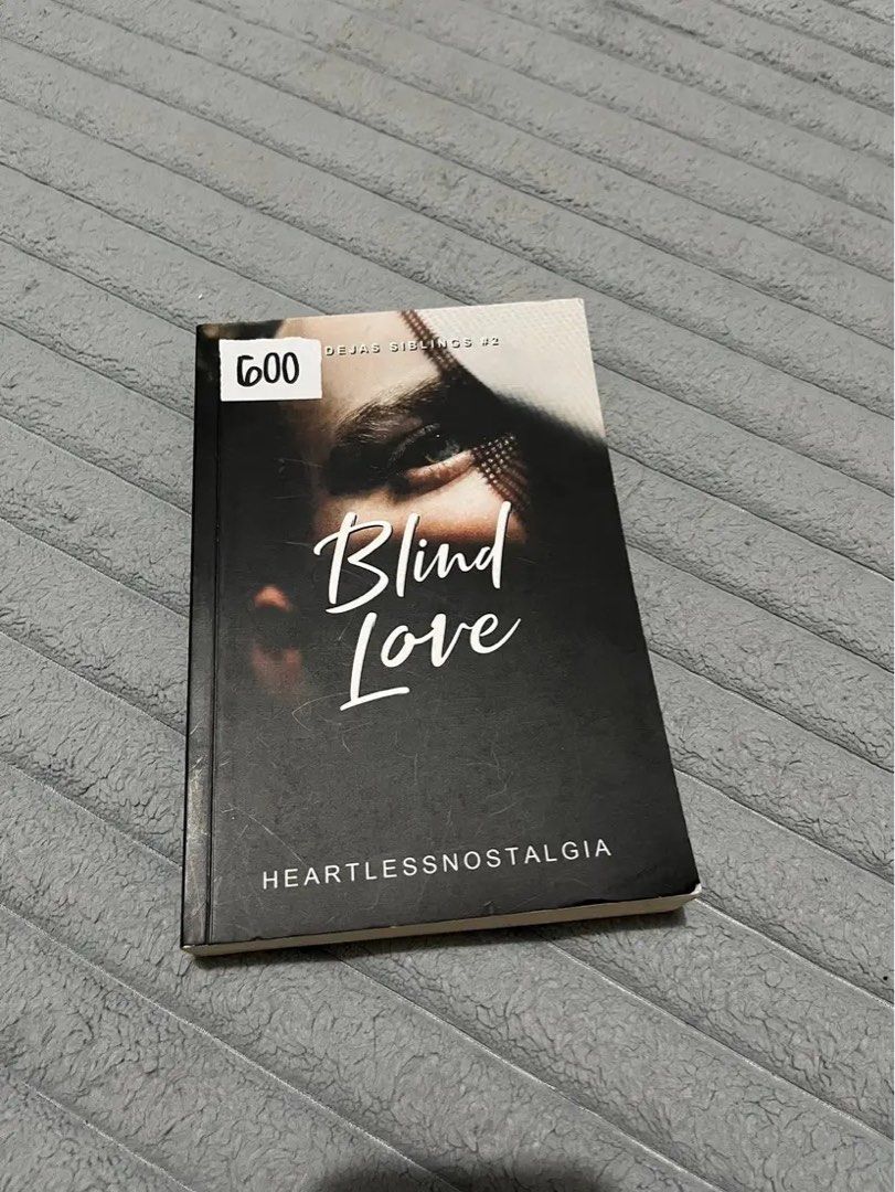 Blind Love by Heartlessnostalgia (Dejas Siblings #2) (Category: Storybooks) located in Quezon City. Submitted by patrishx (Listing ID 1449372220, Image 1). Description: - Title: Blind Love - Author: Heartlessnostalgia - Series: Dejas Siblings (Book 2) - Condition: Cover has minor scuffs, pages inside are clean. - Ideal for: Fans of the Dejas Siblings series.