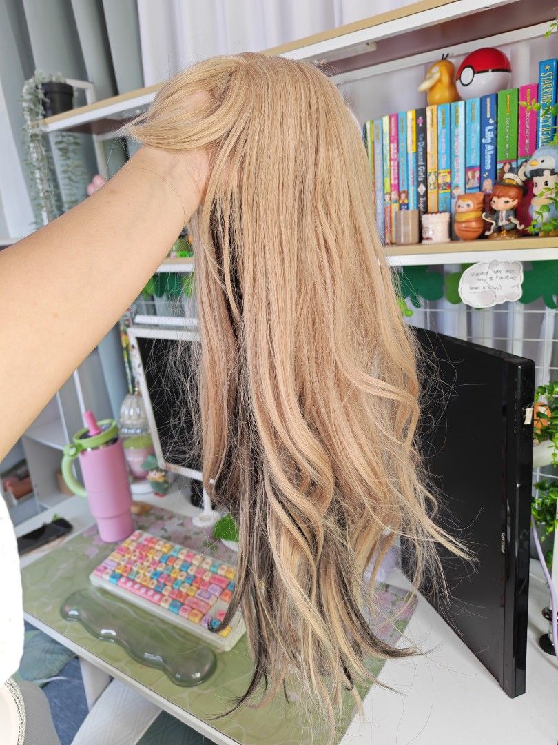 Blonde wavy Wig with black highlights (Category: Hair) located in Quezon City. Submitted by mikhcruz (Listing ID 1449533466, Image 2). Description: Never been used outside, for indoor photos only - Cream, black, and brown wavy wig - 62cm length - Features bangs - Brand: Seven Queen - Matches photos exactly - Ideal for styling and cosplay RFS: di nagagamit .