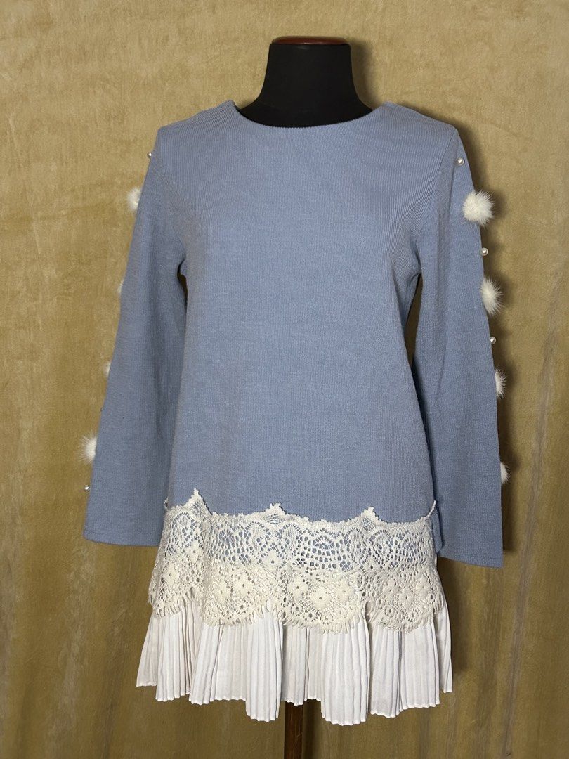 Blue Sweater Top with Lace and Pleates (Category: Dresses) located in Batangas. Submitted by mkjgb (Listing ID 1449410094, Image 1). Description: Bought from Bangkok. Length from shoulder is 30”. Width from waist is 19.5” (laid flat). Can be a dress for shorter girlies. - Adorable blue sweater dress - Long sleeves with pearl and pom-pom details - Elegant lace trim at the waist - Attached white pleated skirt for a complete look - Perfect for a uni
