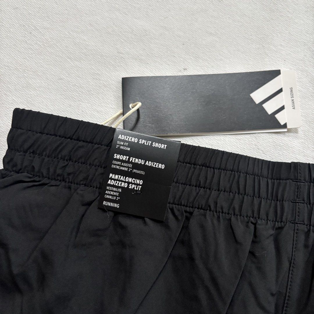 BNEW Adidas Adizero Split Running Shorts (Category: Activewear) located in Mandaluyong City. Submitted by matchaqueen (Listing ID 1449490399, Image 3). Description: - Brand new with tags Adidas Adizero split shorts - Perfect for running and training - Slim fit with a 2" inseam - Lightweight and breathable material - Comfortable elastic waistband - Split sides for enhanced freedom of movement - Comes with original tags.