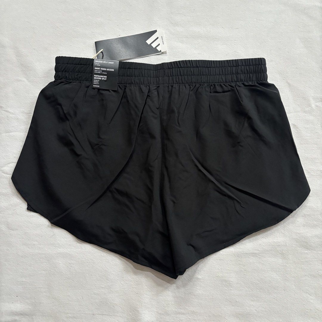 BNEW Adidas Adizero Split Running Shorts (Category: Activewear) located in Mandaluyong City. Submitted by matchaqueen (Listing ID 1449490399, Image 2). Description: - Brand new with tags Adidas Adizero split shorts - Perfect for running and training - Slim fit with a 2" inseam - Lightweight and breathable material - Comfortable elastic waistband - Split sides for enhanced freedom of movement - Comes with original tags.