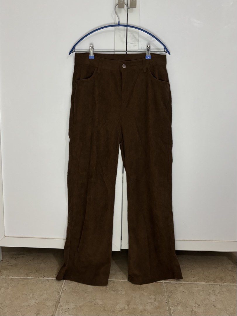 Brown Corduroy Wide Leg Pants (Category: Other Bottoms) located in Santa Rosa. Submitted by paca07 (Listing ID 1449486437, Image 1). Description: W: 31 in L: 40.4 in R: 12 in Brown corduroy pants. Wide leg style. Has a button and zip closure. Two front pockets. Great for casual wear. Measurements available upon request..