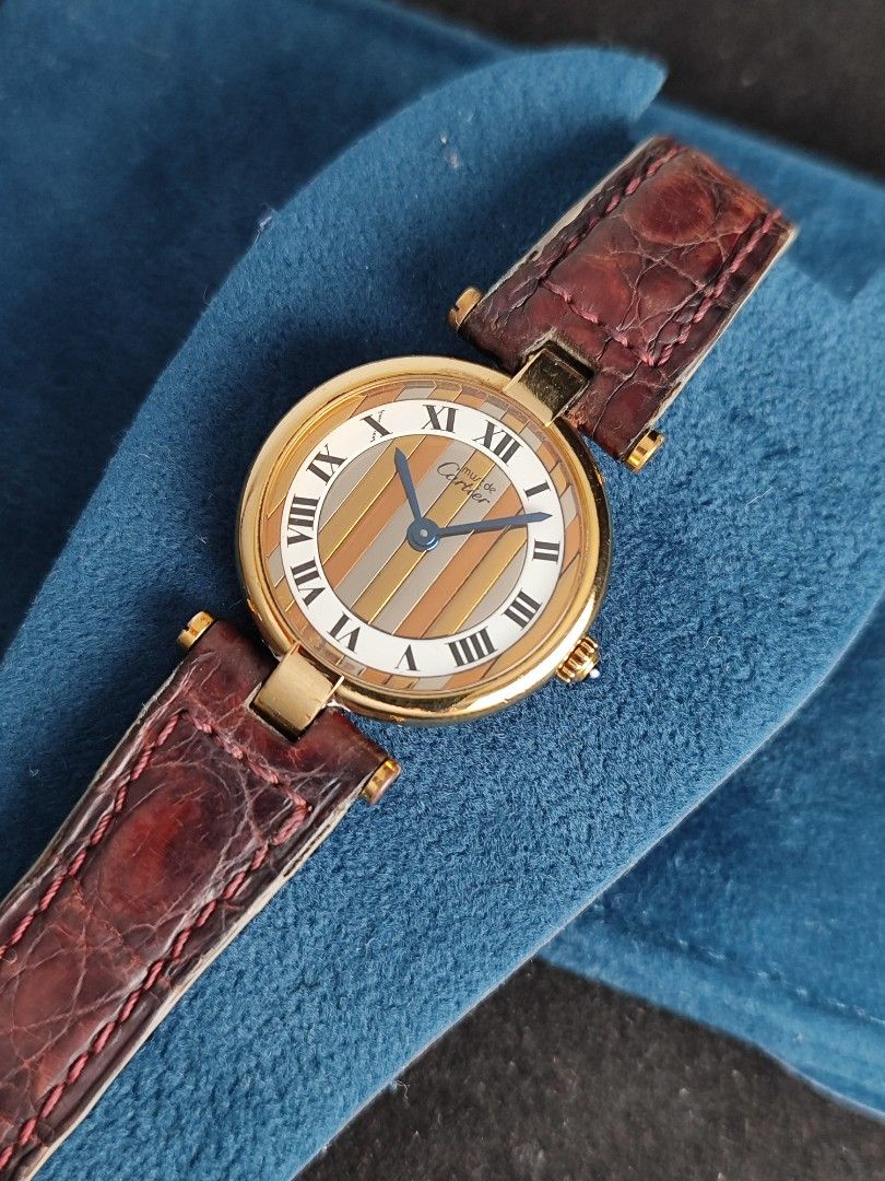 Cartier Must Vendome Trinity Dial 26mm (Category: Women's Watches) located in San Juan City. Submitted by MW_888 (Listing ID 1449493437, Image 1). Description: Cartier Must Vendome Trinity 26mm Trinity / tri color dial Quartz, newly serviced (March 2026) 9/10 condition Inclusions: watch, original Cartier leather strap (mahogany) with original Cartier tang buckle and watch case *photo reference on 6.5" wrist 80k.