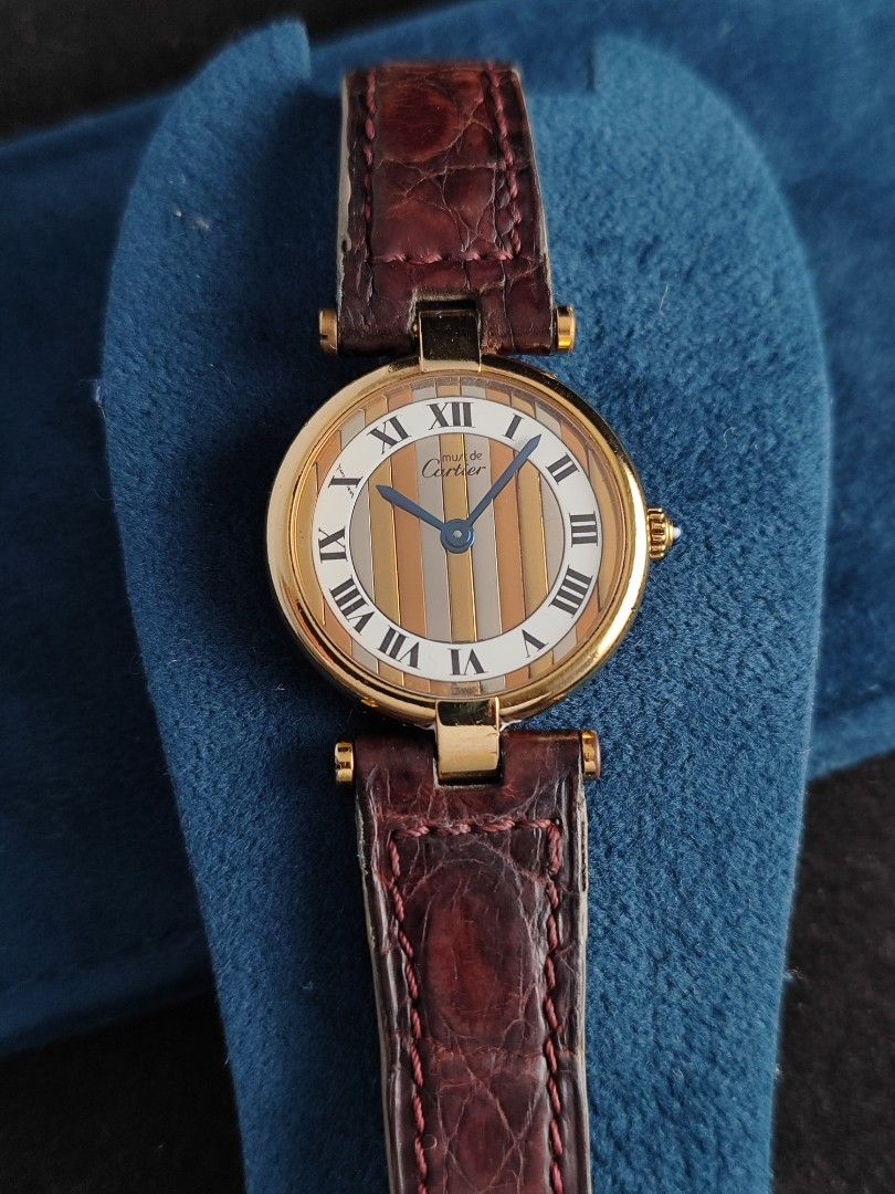 Cartier Must Vendome Trinity Dial 26mm (Category: Women's Watches) located in San Juan City. Submitted by MW_888 (Listing ID 1449493437, Image 2). Description: Cartier Must Vendome Trinity 26mm Trinity / tri color dial Quartz, newly serviced (March 2026) 9/10 condition Inclusions: watch, original Cartier leather strap (mahogany) with original Cartier tang buckle and watch case *photo reference on 6.5" wrist 80k.