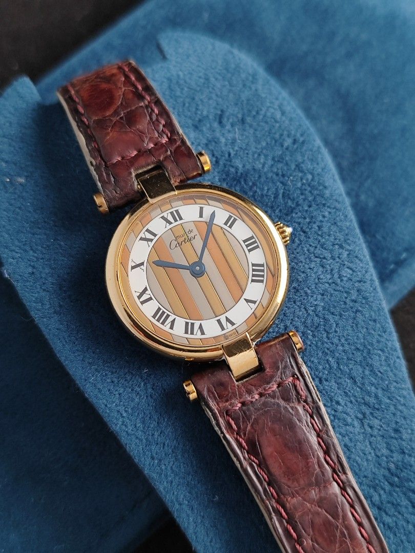 Cartier Must Vendome Trinity Dial 26mm (Category: Women's Watches) located in San Juan City. Submitted by MW_888 (Listing ID 1449493437, Image 3). Description: Cartier Must Vendome Trinity 26mm Trinity / tri color dial Quartz, newly serviced (March 2026) 9/10 condition Inclusions: watch, original Cartier leather strap (mahogany) with original Cartier tang buckle and watch case *photo reference on 6.5" wrist 80k.