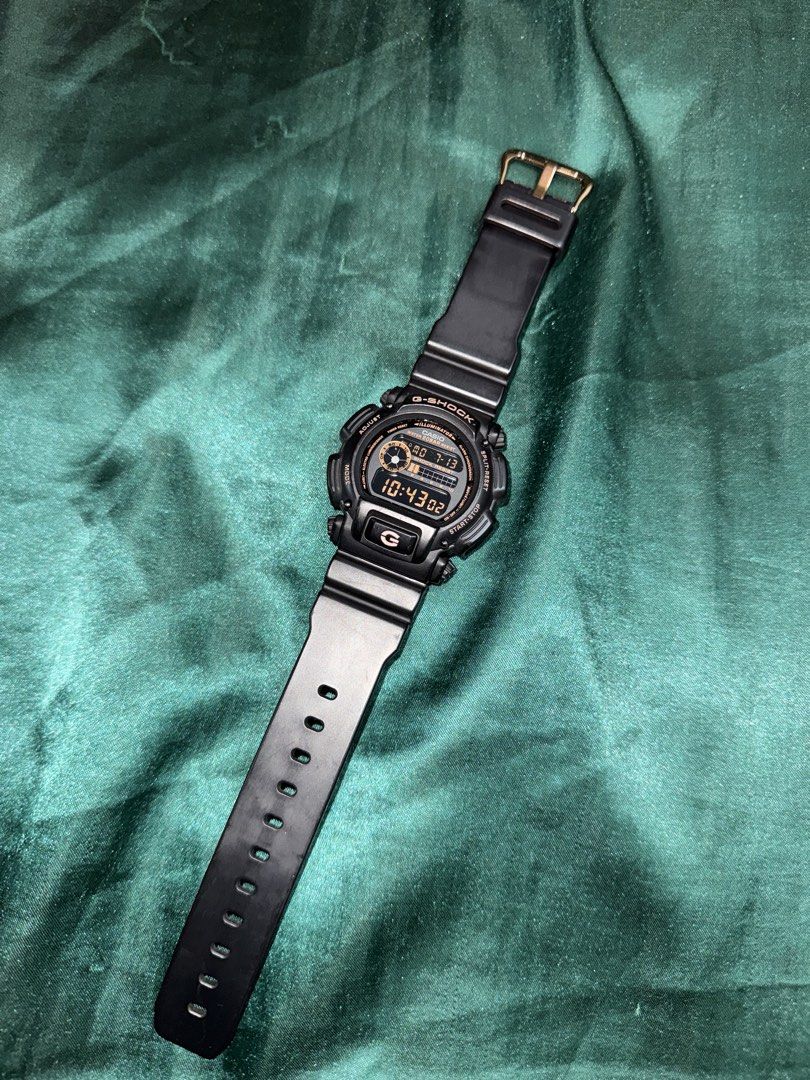 Casio G-Shock DW-9052GBX-1A4DR (Category: Watches) located in Kuala Lumpur. Submitted by faiqq786 (Listing ID 1449350527, Image 2). Description: - G-Shock DW-9052GBX-1A4DR (Anak Katak) - Color: Black with Rose Gold - Includes: Original Box, Manual, Warranty Card - Condition: Good 8/10 - Feel free to ask any questions!.