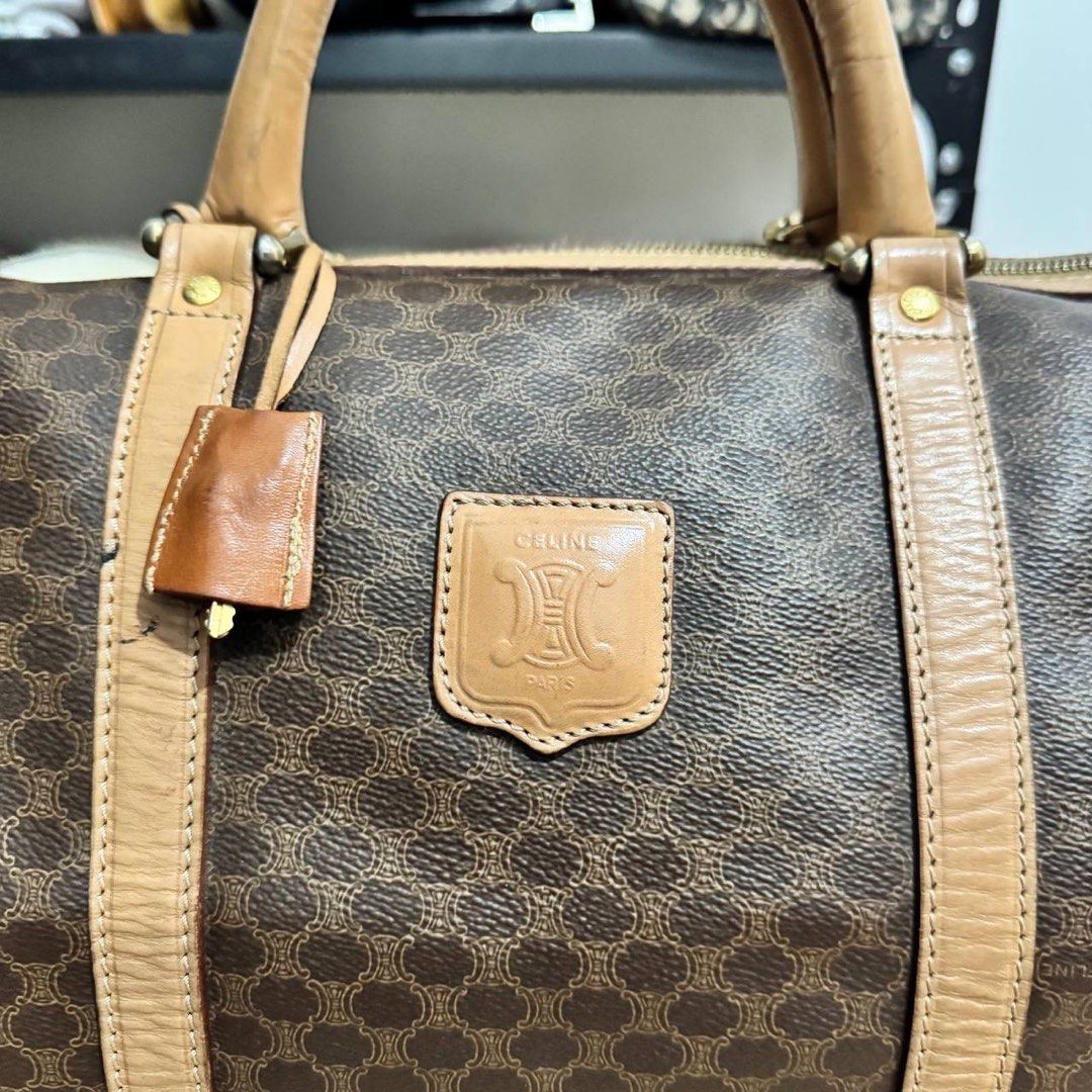 Celine Macadam Boston Bag (Category: Luxury Bags & Wallets) located in Angeles City. Submitted by cherrypicked.ph (Listing ID 1449478759, Image 2). Description: Celine Macadam Boston Bag Condition & Flaws: (See Detailed Pictures Attached) Made in Italy 📐 Measurements in CM Height: 21 cm Width: 40 cm Depth: 21 cm Drop: 13 cm Code: M 14 📎 TAKE NOTE : • Please note that this is a used / thrifted piece, and minor imperfections are part of its uniqu