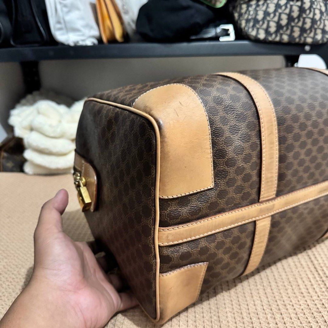 Celine Macadam Boston Bag (Category: Luxury Bags & Wallets) located in Angeles City. Submitted by cherrypicked.ph (Listing ID 1449478759, Image 3). Description: Celine Macadam Boston Bag Condition & Flaws: (See Detailed Pictures Attached) Made in Italy 📐 Measurements in CM Height: 21 cm Width: 40 cm Depth: 21 cm Drop: 13 cm Code: M 14 📎 TAKE NOTE : • Please note that this is a used / thrifted piece, and minor imperfections are part of its uniqu