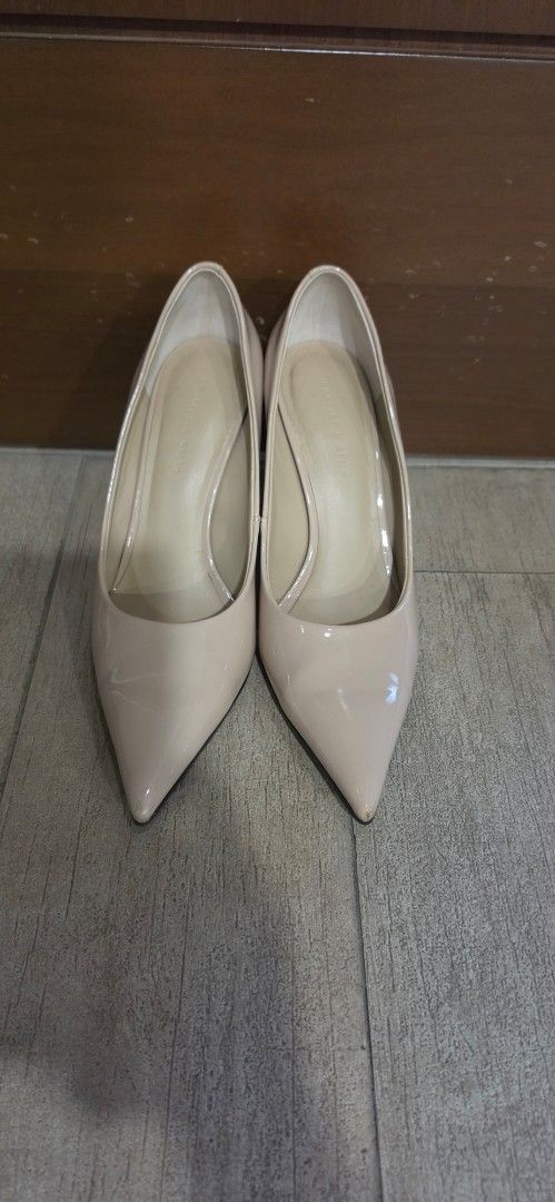 Charles & Keith Beige Patent Pointed Toe Heels (Category: Heels) located in Petaling Jaya. Submitted by roseisrose (Listing ID 1449440707, Image 1). Description: - Brand: Charles & Keith - Color: Beige - Material: Patent - Style: Pointed toe heels - Feature: Shiny gold heel detail - Sole: Good grip.