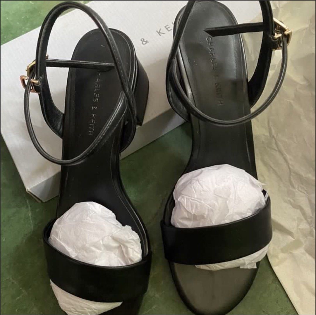 Charles & Keith Black Block Heel Ankle Strap Sandals (Category: Heels) located in Rizal. Submitted by melowfashion_preloved (Listing ID 1449501811, Image 3). Description: PLEASE READ 👇 ❌No to BOGUS buyer ✅ Item is AVAILABLE 📍Rizal, shipping via Lalamove or Grab - Brand: Charles & Keith - Color: Black -Size: US6, 23cm - Style: Block heel sandals - Features: Ankle strap with buckle closure, single wide strap across toes - Includes: Original box a
