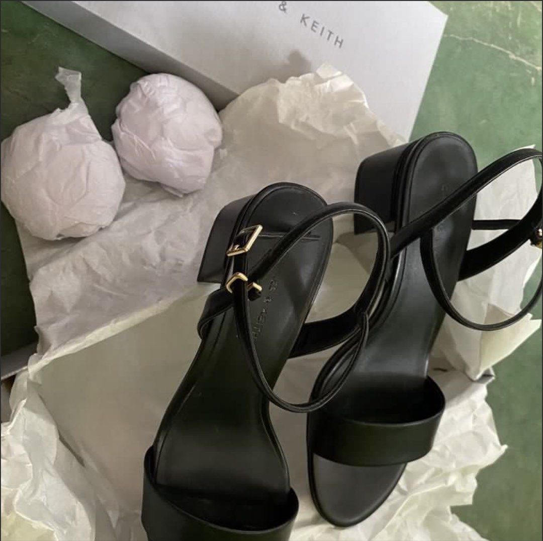 Charles & Keith Black Block Heel Ankle Strap Sandals (Category: Heels) located in Rizal. Submitted by melowfashion_preloved (Listing ID 1449501811, Image 2). Description: PLEASE READ 👇 ❌No to BOGUS buyer ✅ Item is AVAILABLE 📍Rizal, shipping via Lalamove or Grab - Brand: Charles & Keith - Color: Black -Size: US6, 23cm - Style: Block heel sandals - Features: Ankle strap with buckle closure, single wide strap across toes - Includes: Original box a